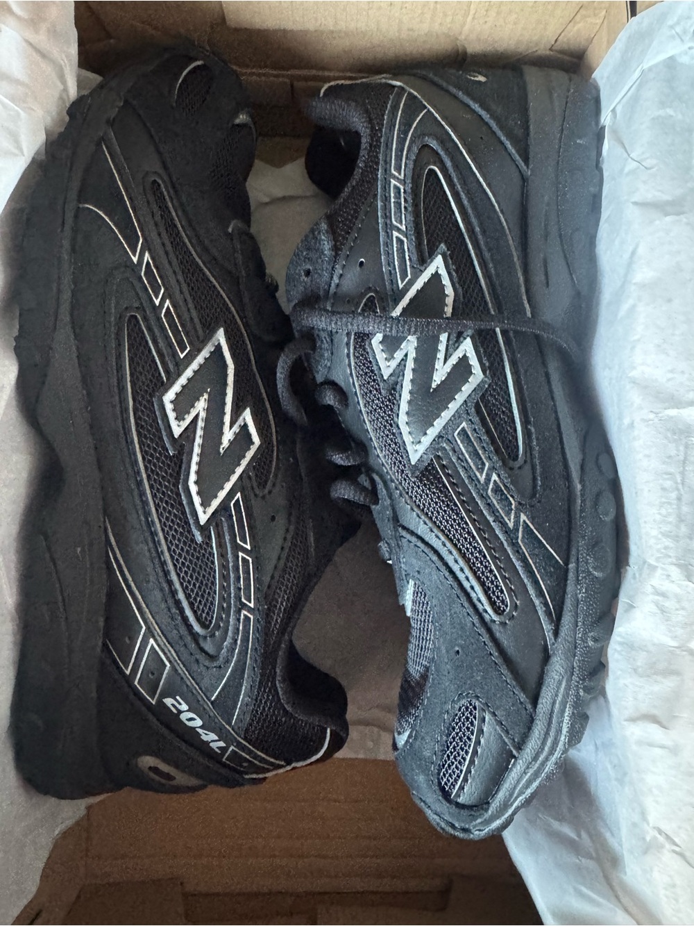 New Balance Kids Black Sneakers with Silver Accents